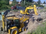 Послуги екскаваторами, міні екскаваторами Caterpillar, навантажувачами Komatsu, гусеничним екскаватором Doosan
